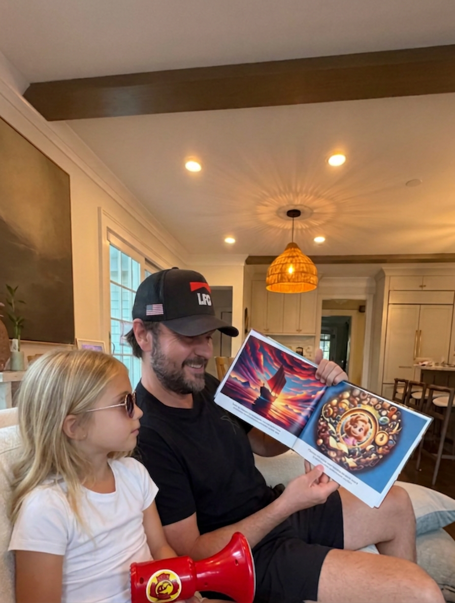 A father reading a personalized For You Tales book with his daughter at home